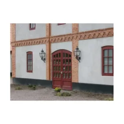 Eriksberg vägglykta m gjuten arm, koppar/svart
